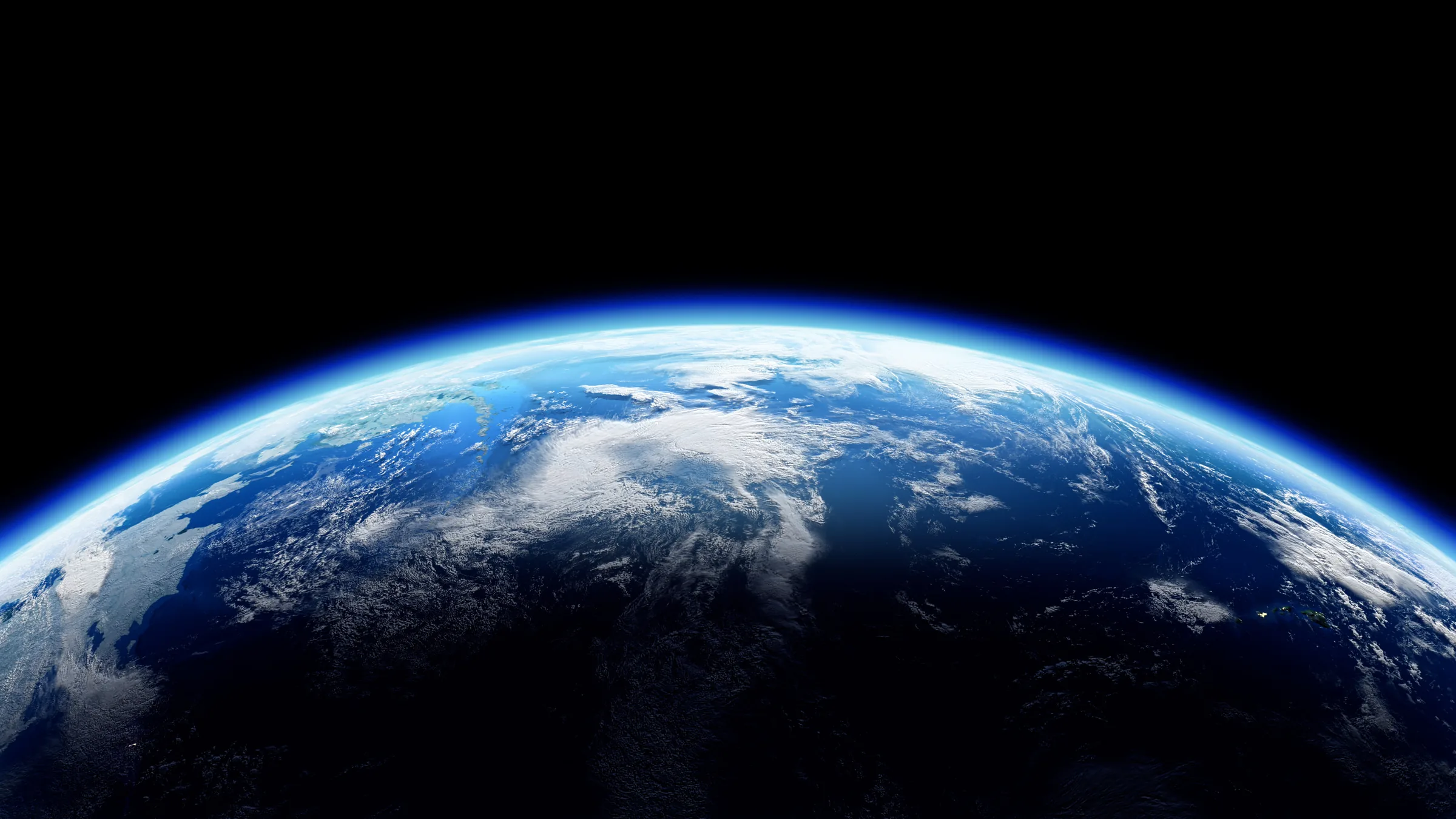 La Terra vista dallo spazio, con la fascia luminosa dell'atmosfera sull'orizzonte